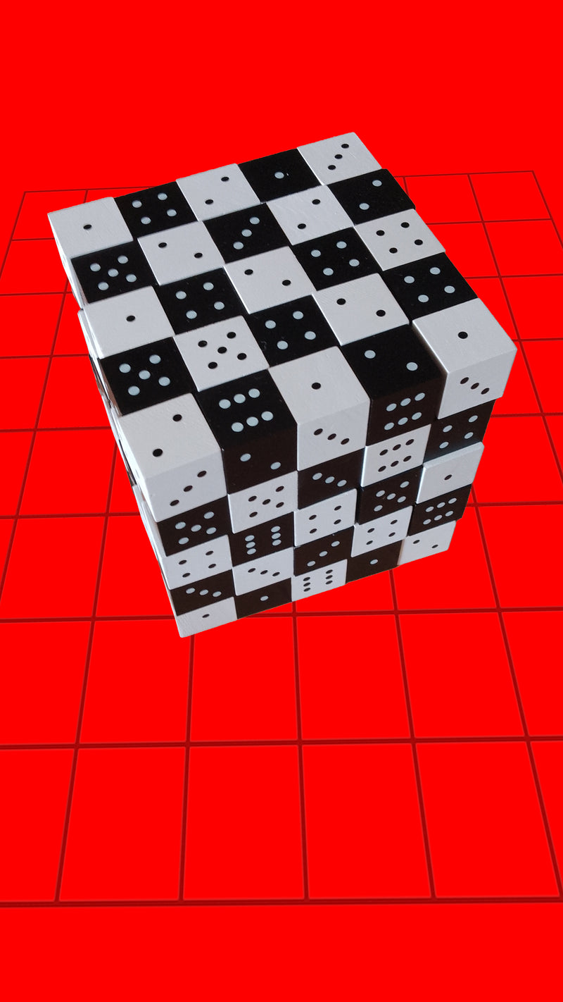 CUBE game — a 5x5x5 cube made of black and white dice on a red grid background